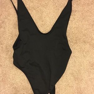 Black one piece thong bathing suit